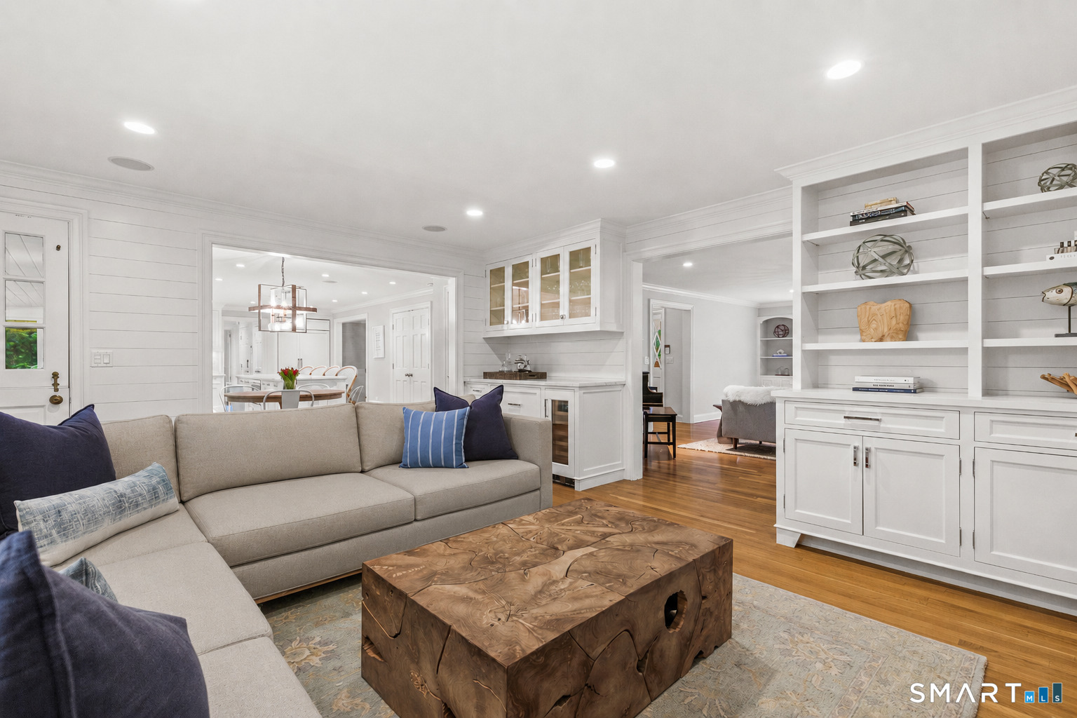 599 North Wilton Road New Canaan, CT 06840 - Photo 7 of 37 Family room w/ dry bar and custom built-ins