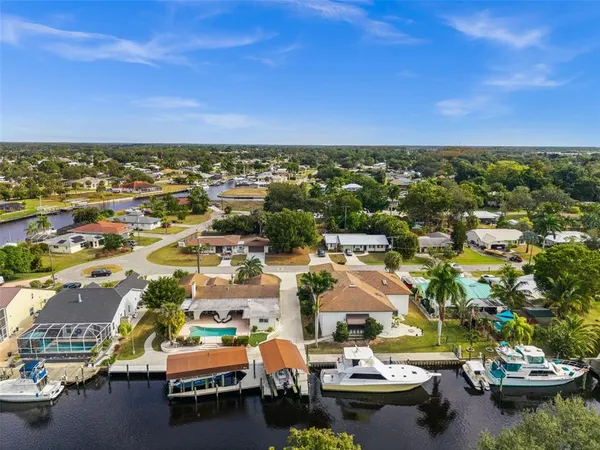 a view of a city with lawn chairs