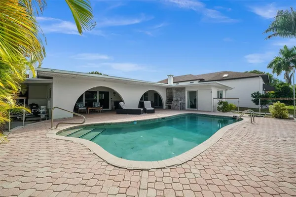 a view of a house with entertaining space