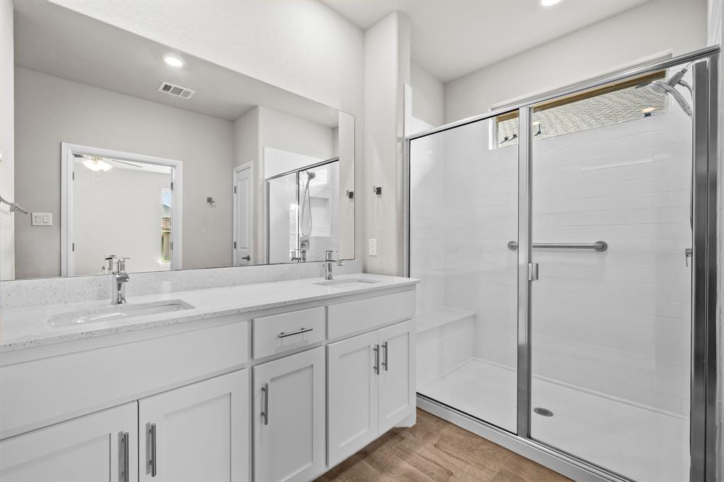 1840 Ruffian Road Granbury, TX 76049 - Photo 20 of 33 Dual vanity with undermount sinks and stone-finish countertop