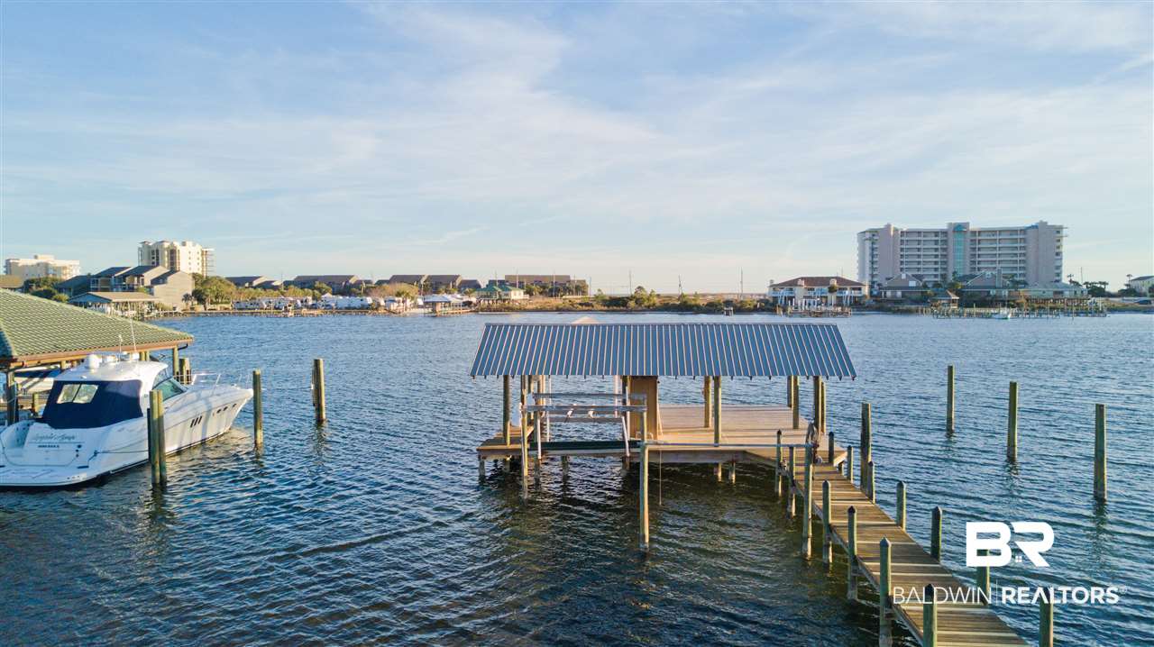 29892 Ono Boulevard Orange Beach, AL 36561 - Photo 18 of 45 Notice the Large Boat next to our dock