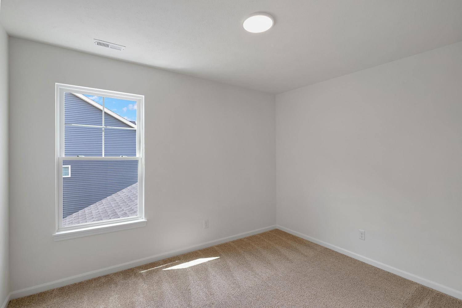 557 East 130th Lane Crown Point, IN 46307 - Photo 15 of 23 an empty room with a window