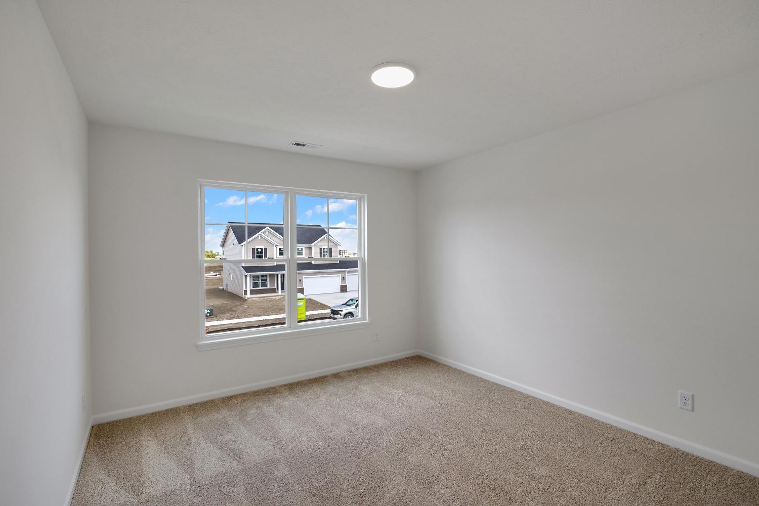 557 East 130th Lane Crown Point, IN 46307 - Photo 16 of 23 an empty room with windows and air conditioner