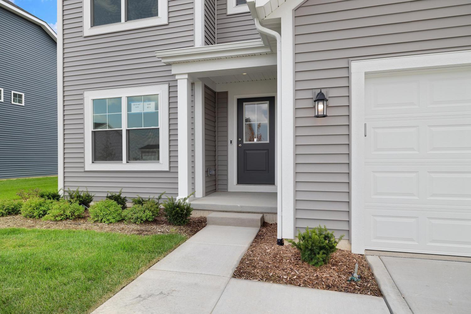 557 East 130th Lane Crown Point, IN 46307 - Photo 2 of 23 a view of a house with brick walls