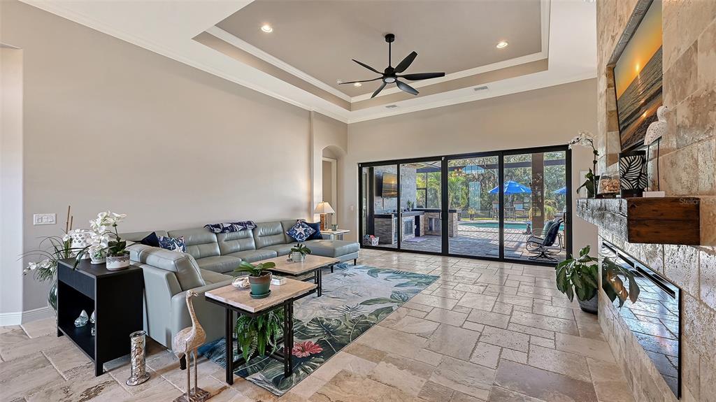 15425 Mulholland Road Parrish, FL 34219 - Photo 19 of 67 a living room with furniture and a flat screen tv