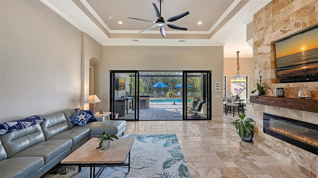 15425 Mulholland Road Parrish, FL 34219 - Photo 21 of 67 a living room with furniture and a flat screen tv