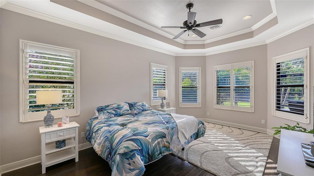 15425 Mulholland Road Parrish, FL 34219 - Photo 32 of 67 a bedroom with a bed and a window