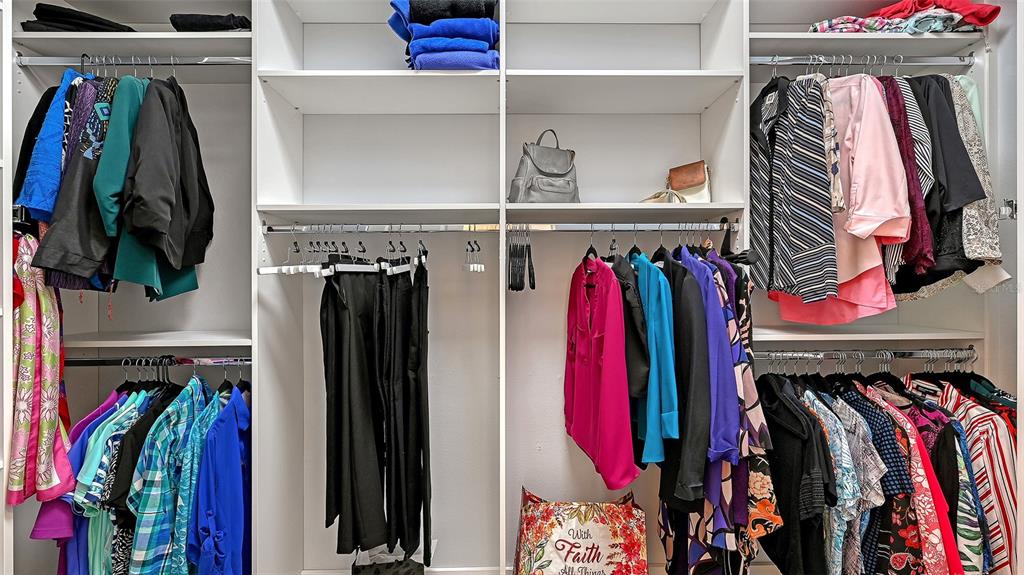 15425 Mulholland Road Parrish, FL 34219 - Photo 34 of 67 a view of walk in closet with clothes