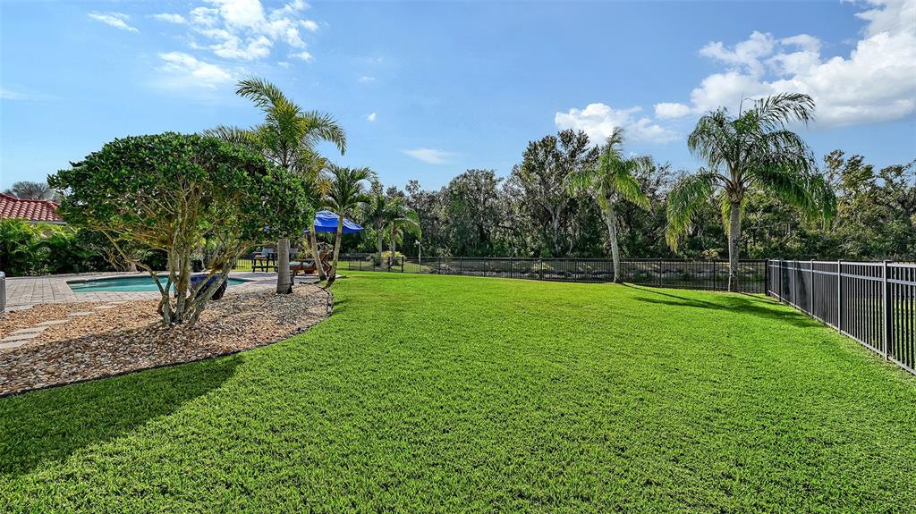 15425 Mulholland Road Parrish, FL 34219 - Photo 54 of 67 a view of a garden with a slide