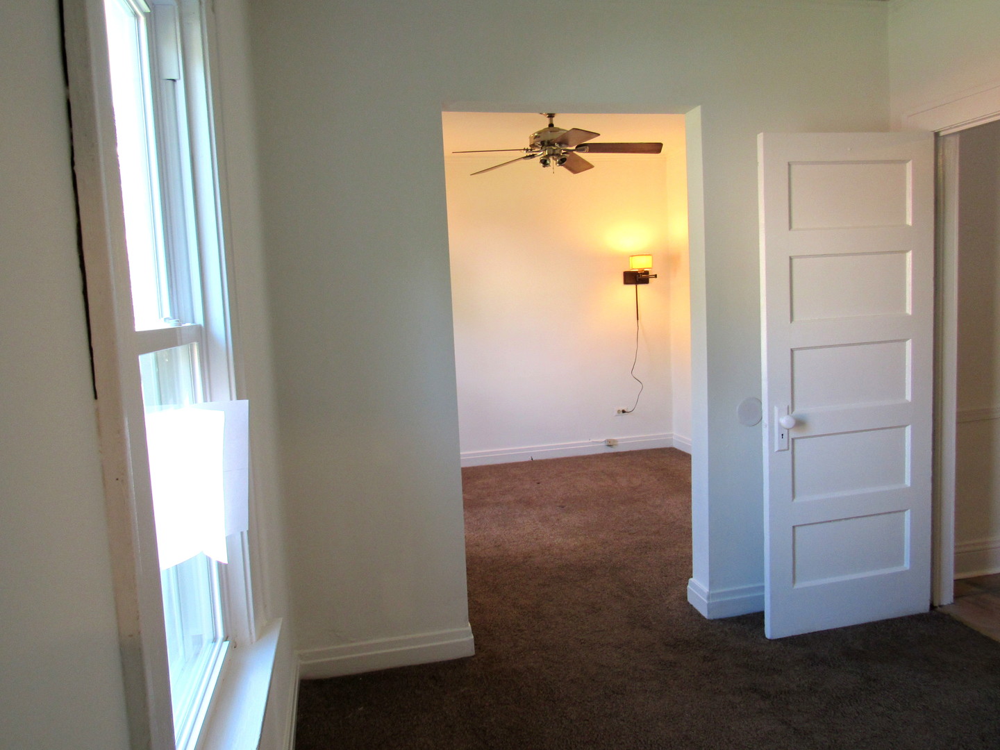 14446 Ridgeway Avenue Midlothian, IL 60445 - Photo 11 of 18 an empty room with windows