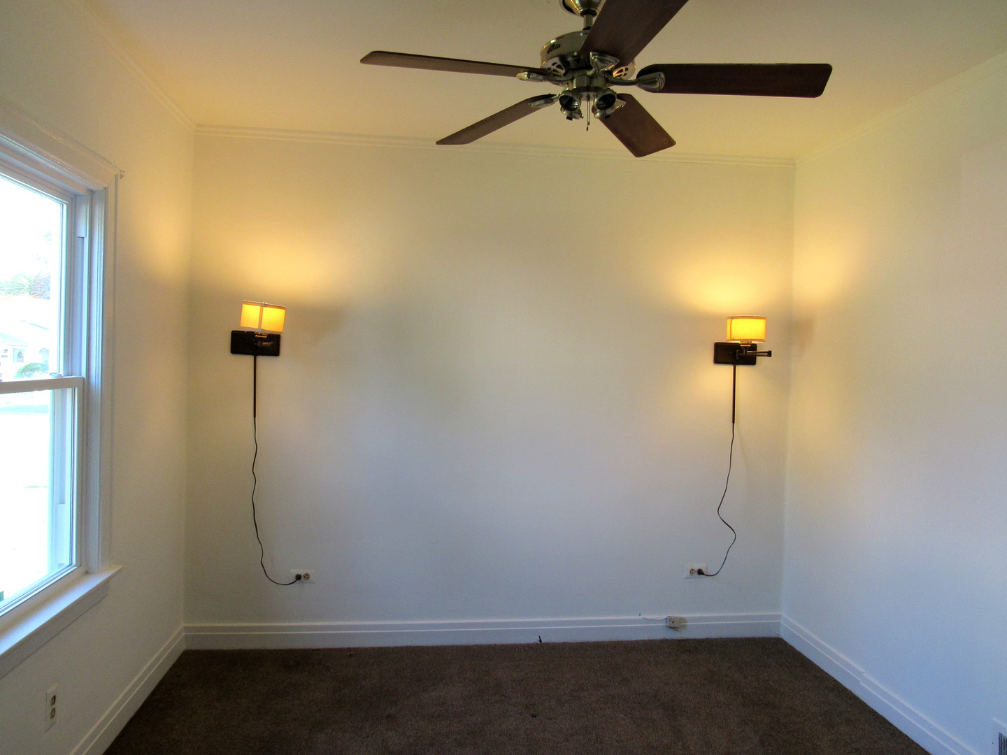 14446 Ridgeway Avenue Midlothian, IL 60445 - Photo 12 of 18 an empty room with a window