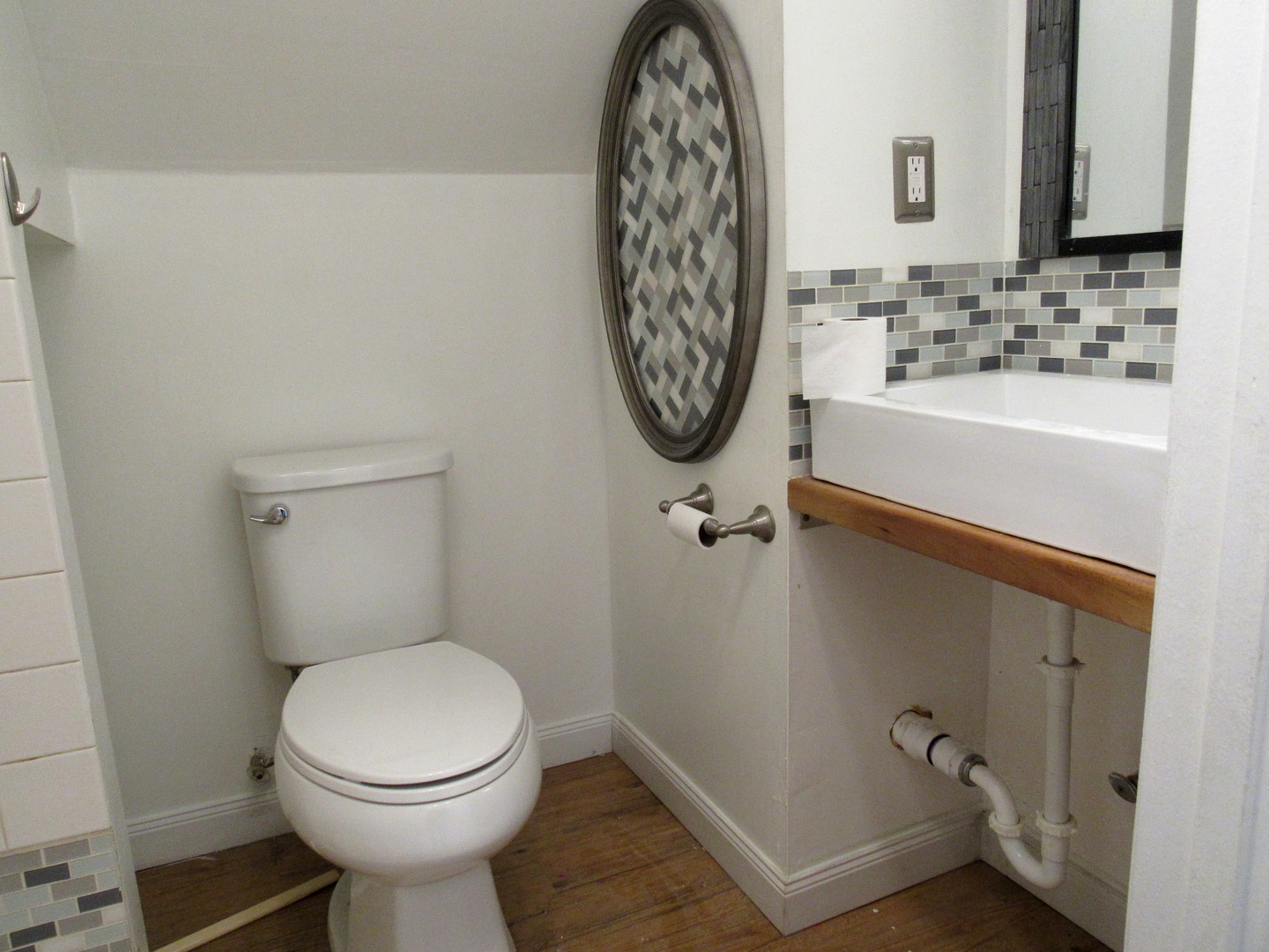 14446 Ridgeway Avenue Midlothian, IL 60445 - Photo 18 of 18 a bathroom with a toilet sink and mirror