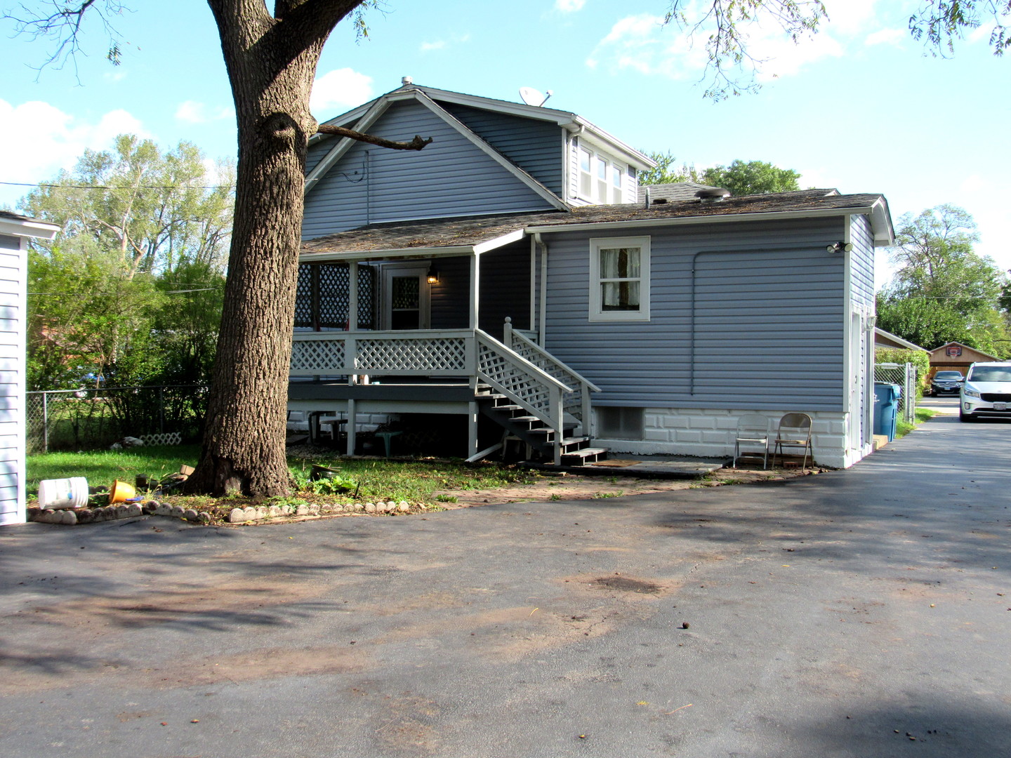 14446 Ridgeway Avenue Midlothian, IL 60445 - Photo 3 of 18 a view of a house with a street