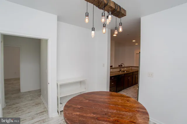 a view of a kitchen cabinets and a wooden floor