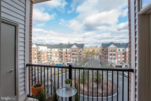 a view of a balcony with city view