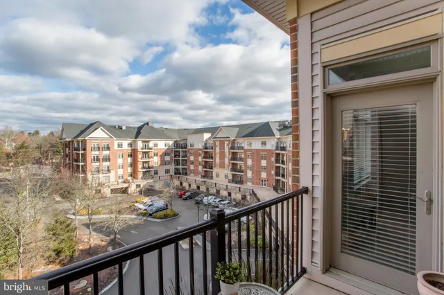 a view of a balcony with city view