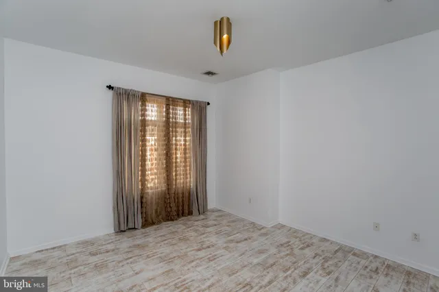 a bathroom with a shower and toilet