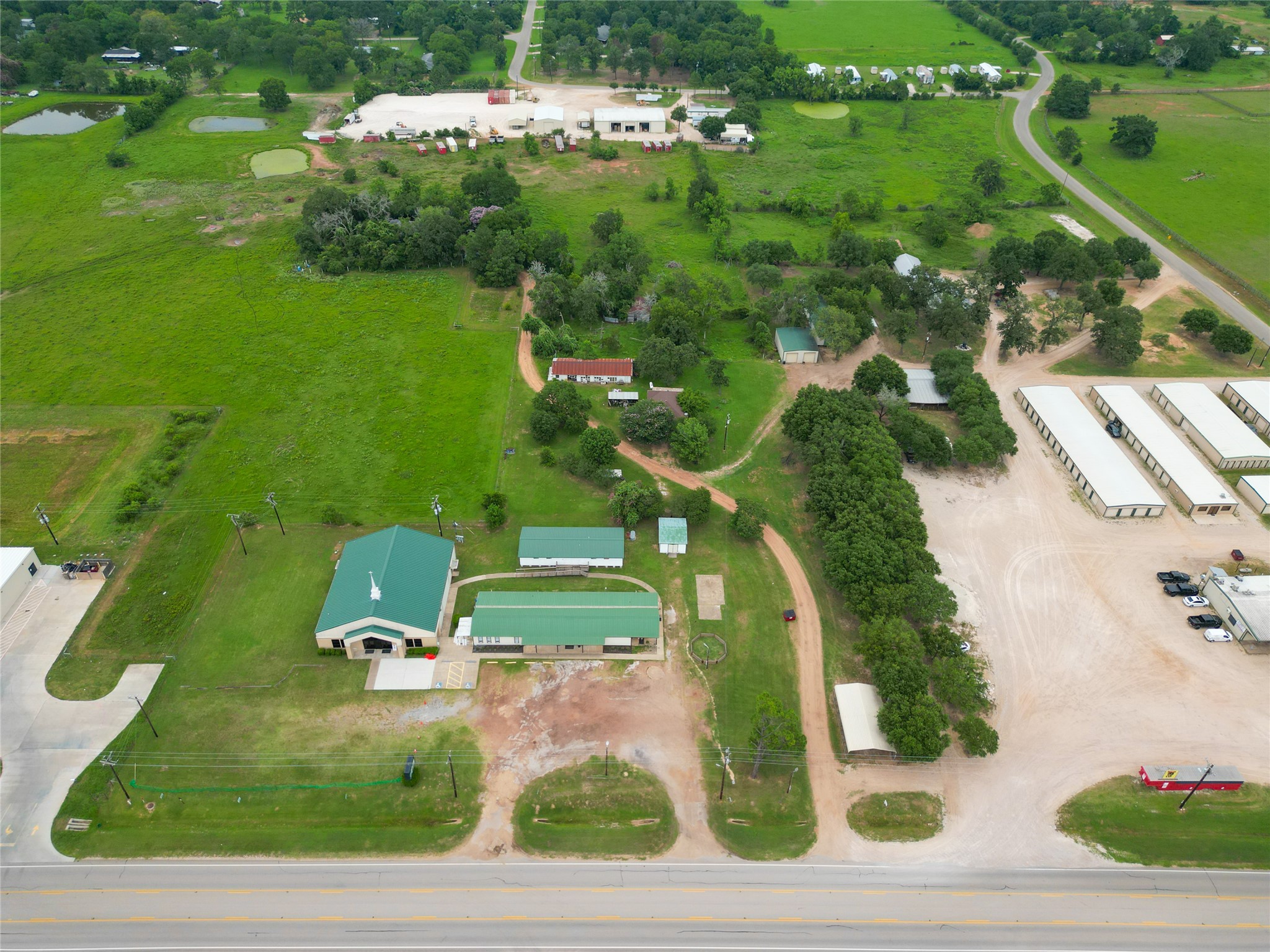 2 Fm 1488 Road Waller, TX 77484 - Photo 25 of 28 an aerial view of a house with a yard basket ball court and outdoor seating