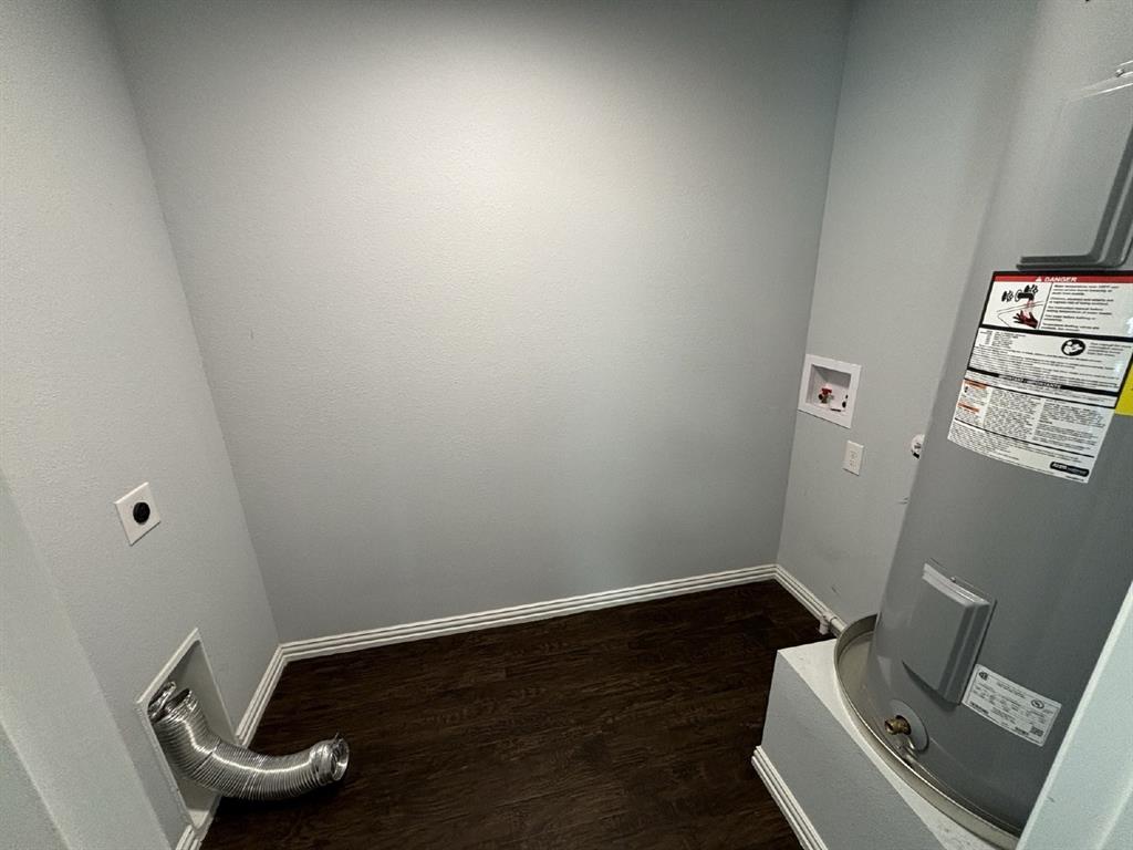 108 Arrowhead Street, Unit B Fort Worth, TX 76108 - Photo 17 of 17 a room with a wooden floor and a sink