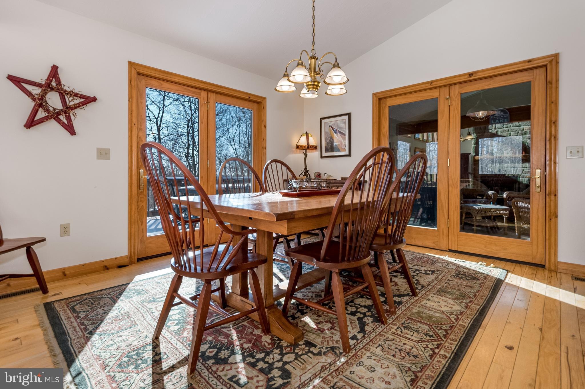 41 Wilson Circle Swanton, MD 21561 - Photo 15 of 63 a view of a dining room with furniture window and wooden floor