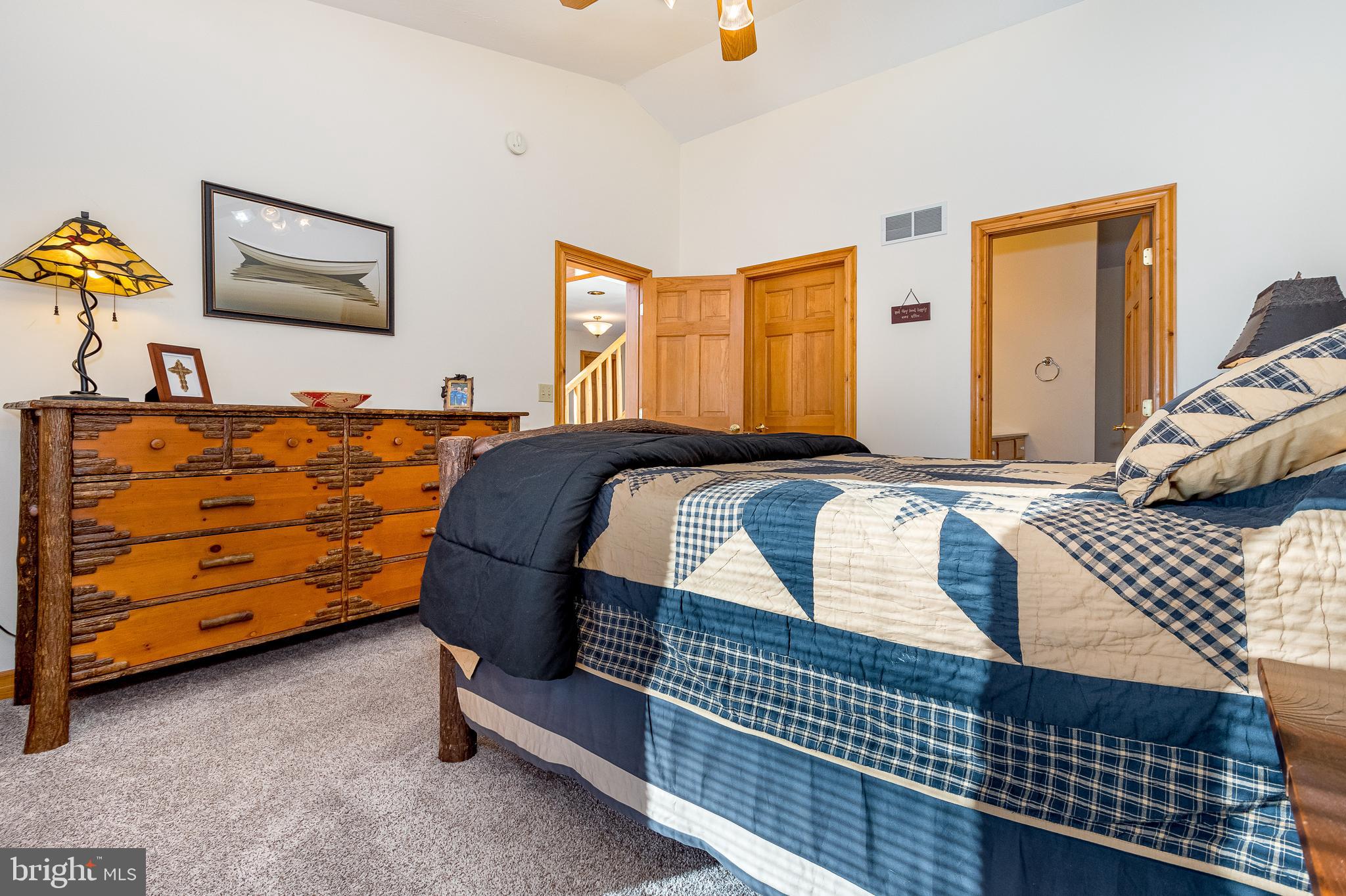 41 Wilson Circle Swanton, MD 21561 - Photo 28 of 63 a bedroom with a bed and a window