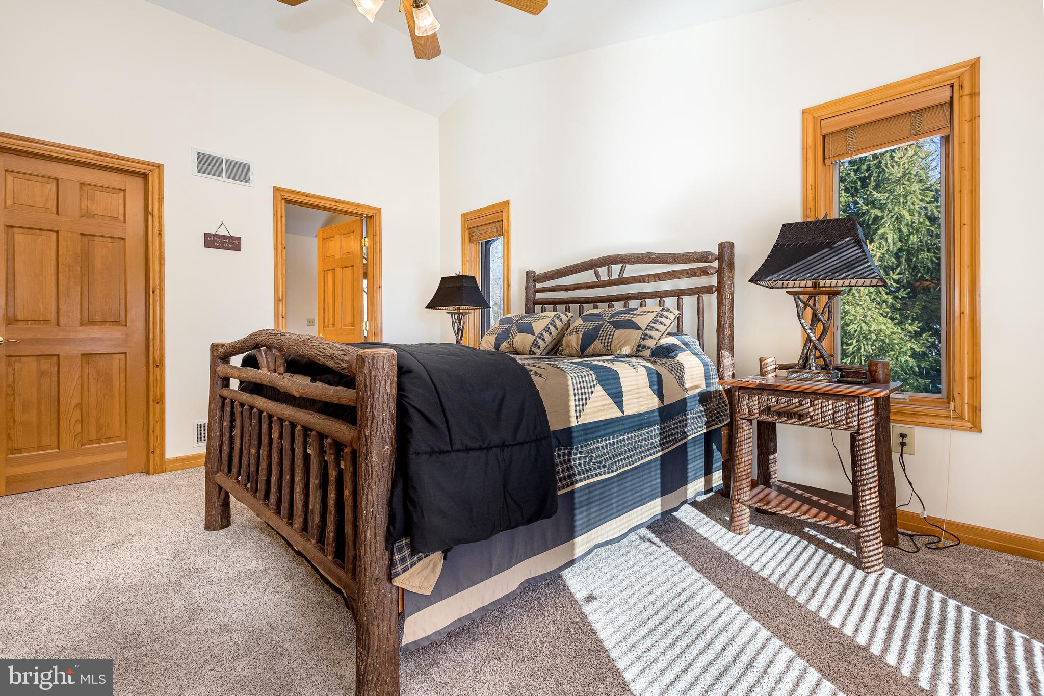 41 Wilson Circle Swanton, MD 21561 - Photo 29 of 63 a bedroom with furniture and a window