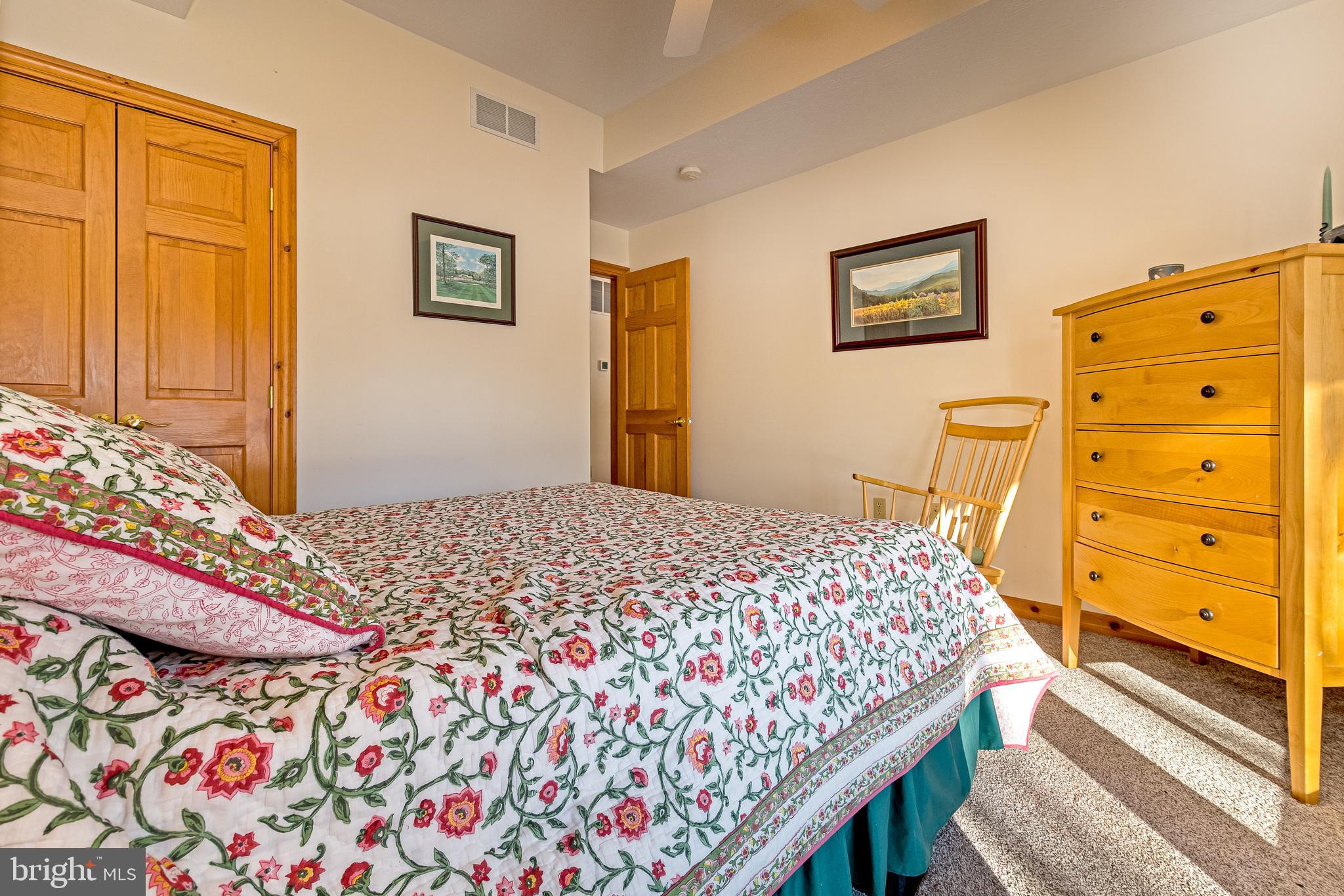 41 Wilson Circle Swanton, MD 21561 - Photo 34 of 63 a bedroom with a bed and a window