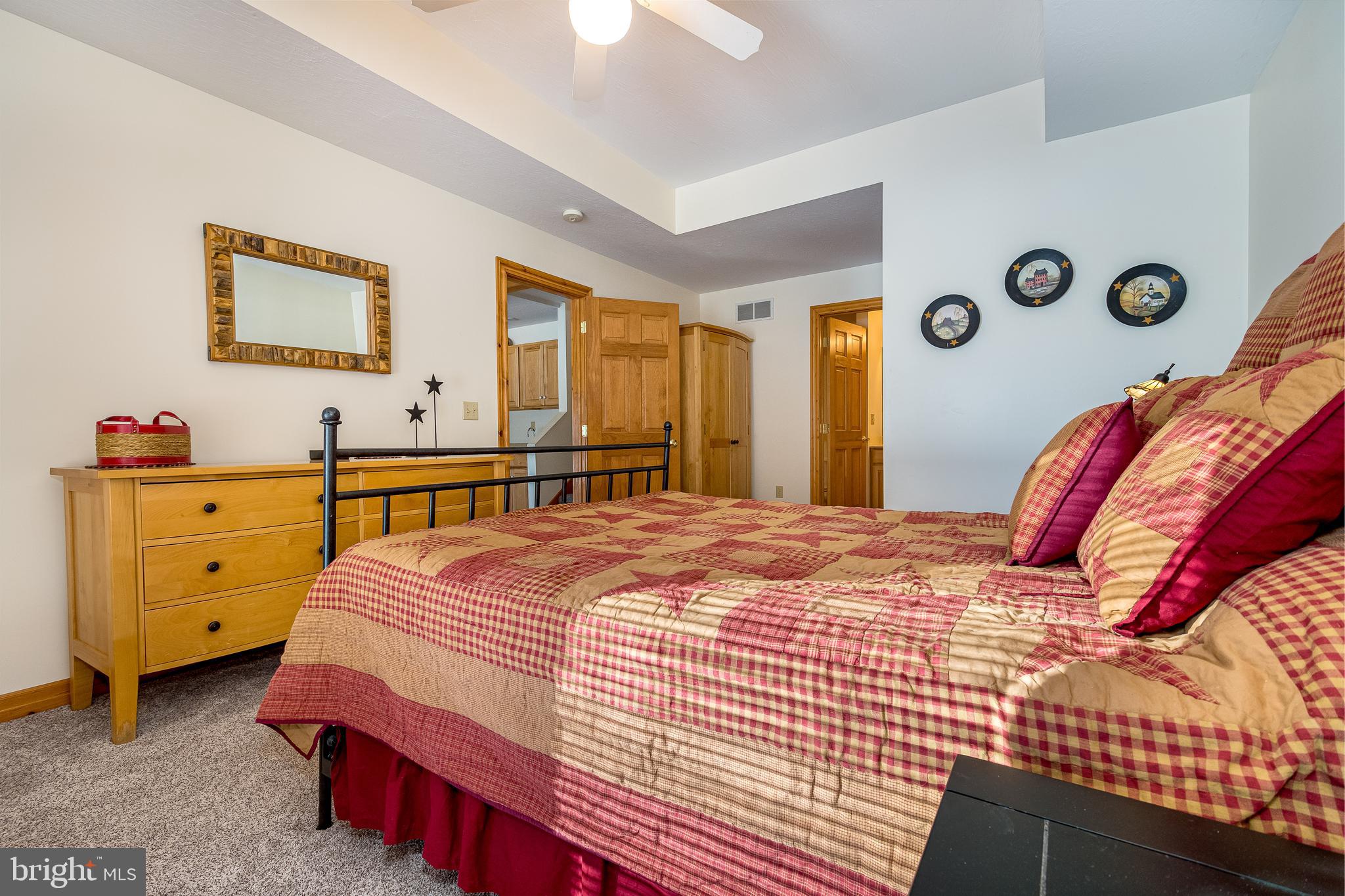 41 Wilson Circle Swanton, MD 21561 - Photo 36 of 63 a bedroom with a bed and a dresser