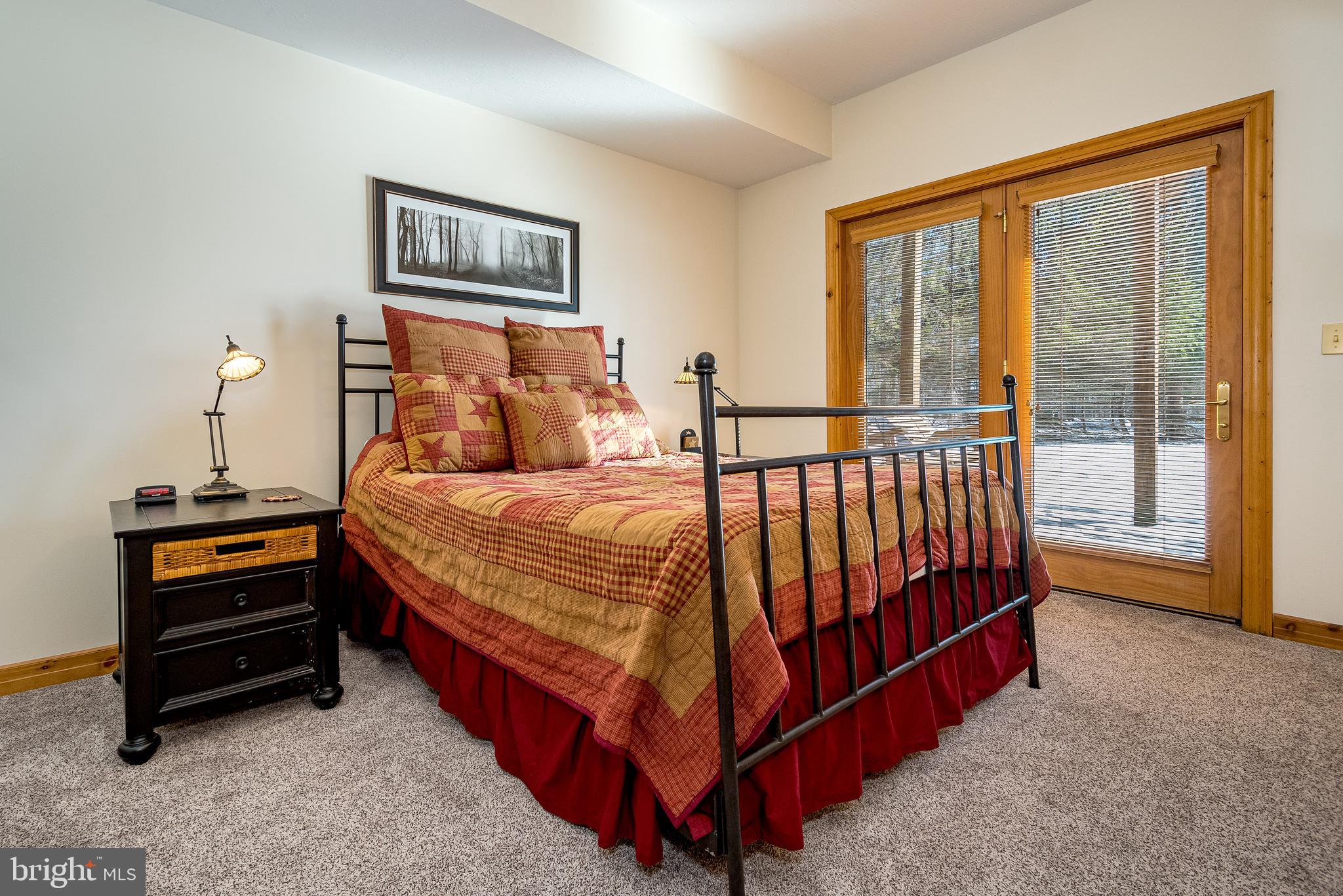 41 Wilson Circle Swanton, MD 21561 - Photo 39 of 63 a bed room with a bed and a window