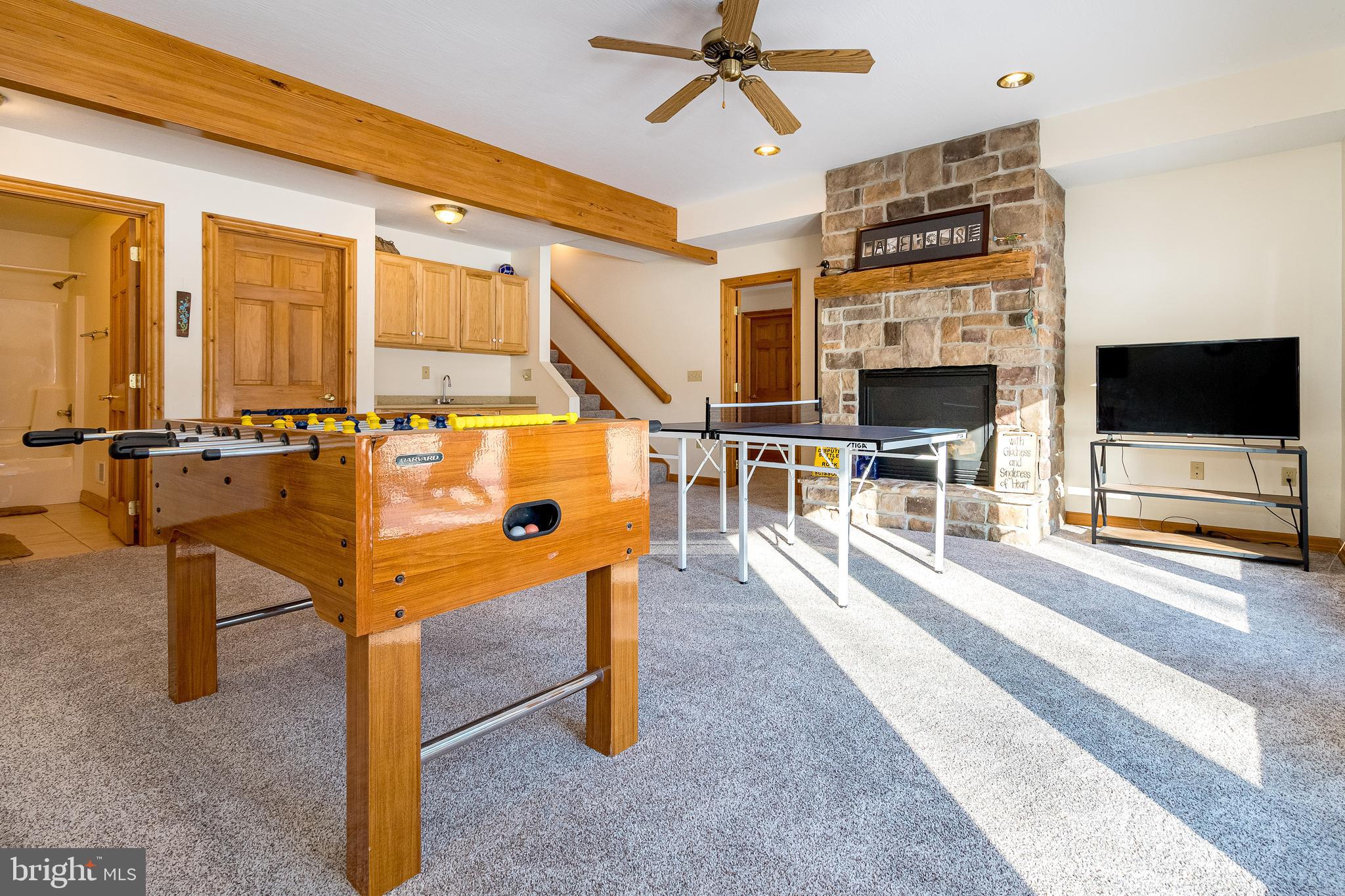 41 Wilson Circle Swanton, MD 21561 - Photo 42 of 63 a living room with furniture a flat screen tv and a table