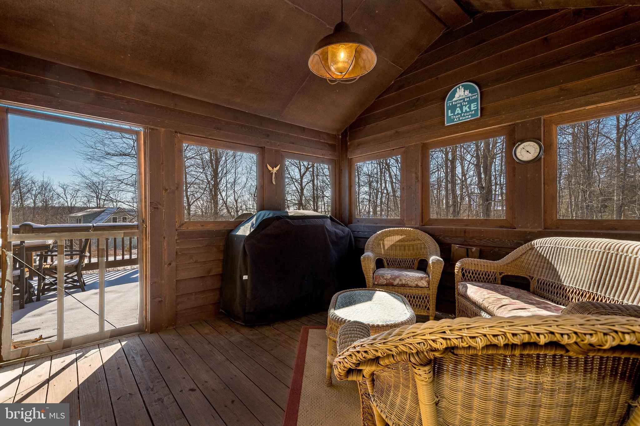 41 Wilson Circle Swanton, MD 21561 - Photo 44 of 63 a view of a livingroom with furniture and window