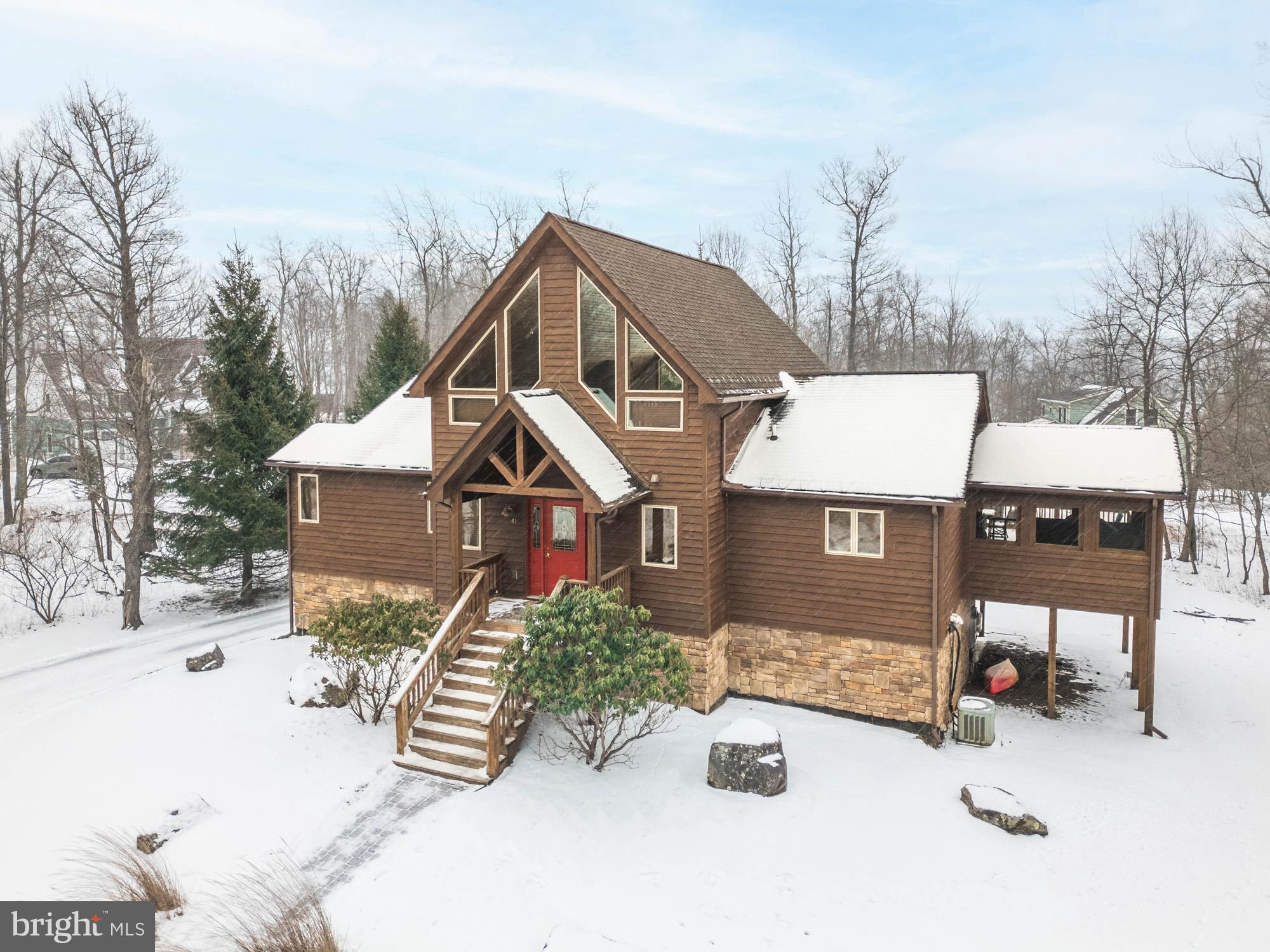 41 Wilson Circle Swanton, MD 21561 - Photo 45 of 63 a front view of a house with a yard
