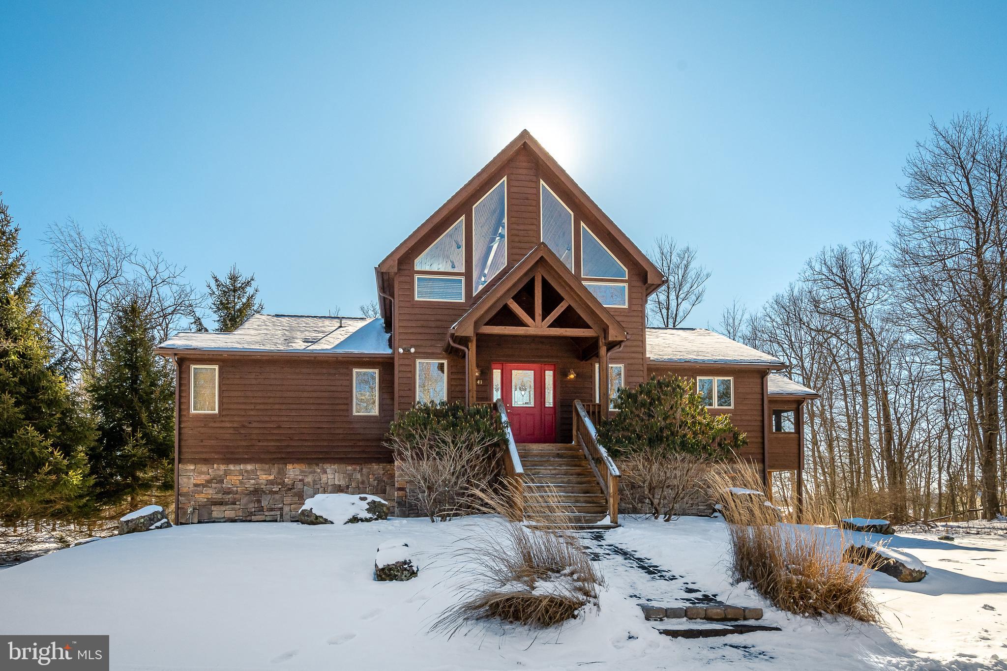 41 Wilson Circle Swanton, MD 21561 - Photo 52 of 63 a front view of a house with a yard