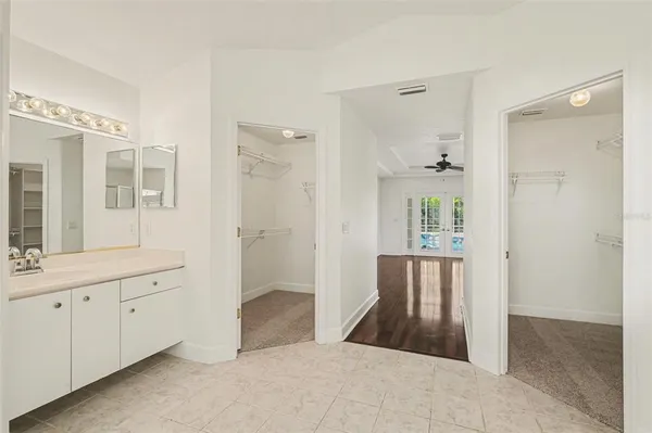 a view of a bathroom with a shower and a sink