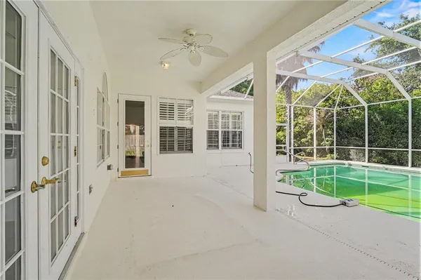 a view of an house with a swimming pool
