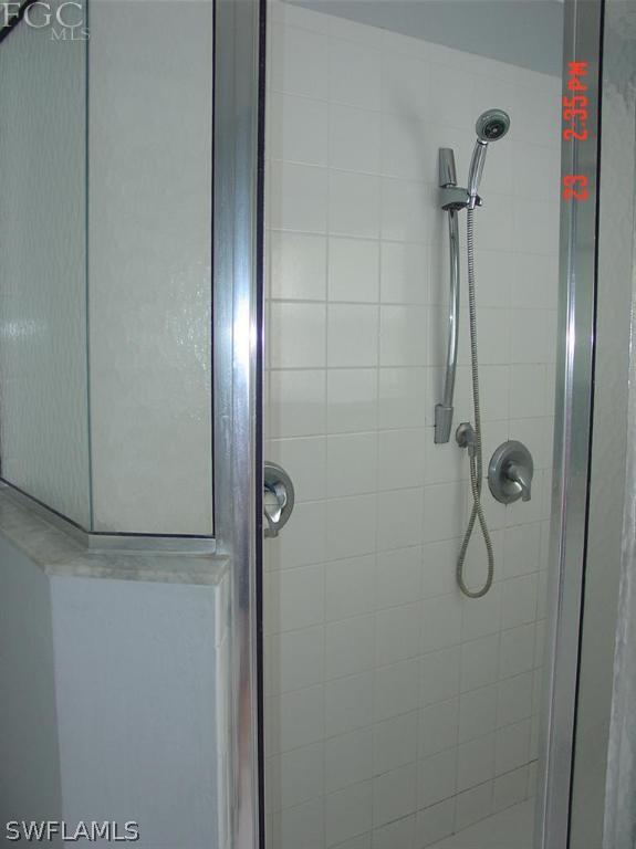 15921 Cemetery Road Fort Myers, FL 33905 - Photo 13 of 25 a bathroom with a shower
