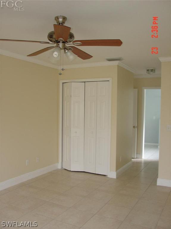 15921 Cemetery Road Fort Myers, FL 33905 - Photo 15 of 25 a view of a chandelier fan in a room