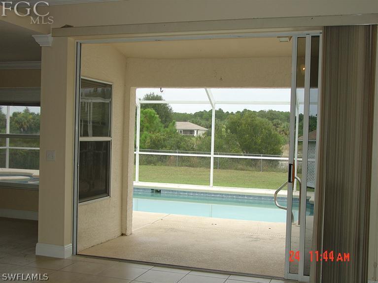 15921 Cemetery Road Fort Myers, FL 33905 - Photo 23 of 25 a view of outdoor space with sliding door