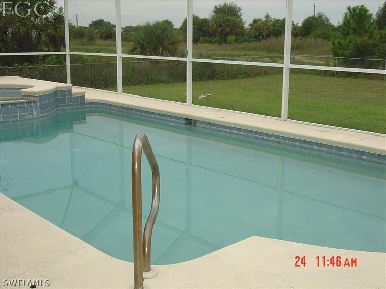15921 Cemetery Road Fort Myers, FL 33905 - Photo 4 of 25 a view of a room with a entertaining space