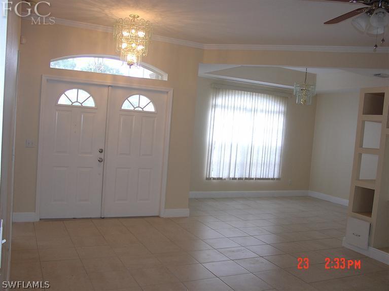 15921 Cemetery Road Fort Myers, FL 33905 - Photo 7 of 25 a view of an empty room with a window