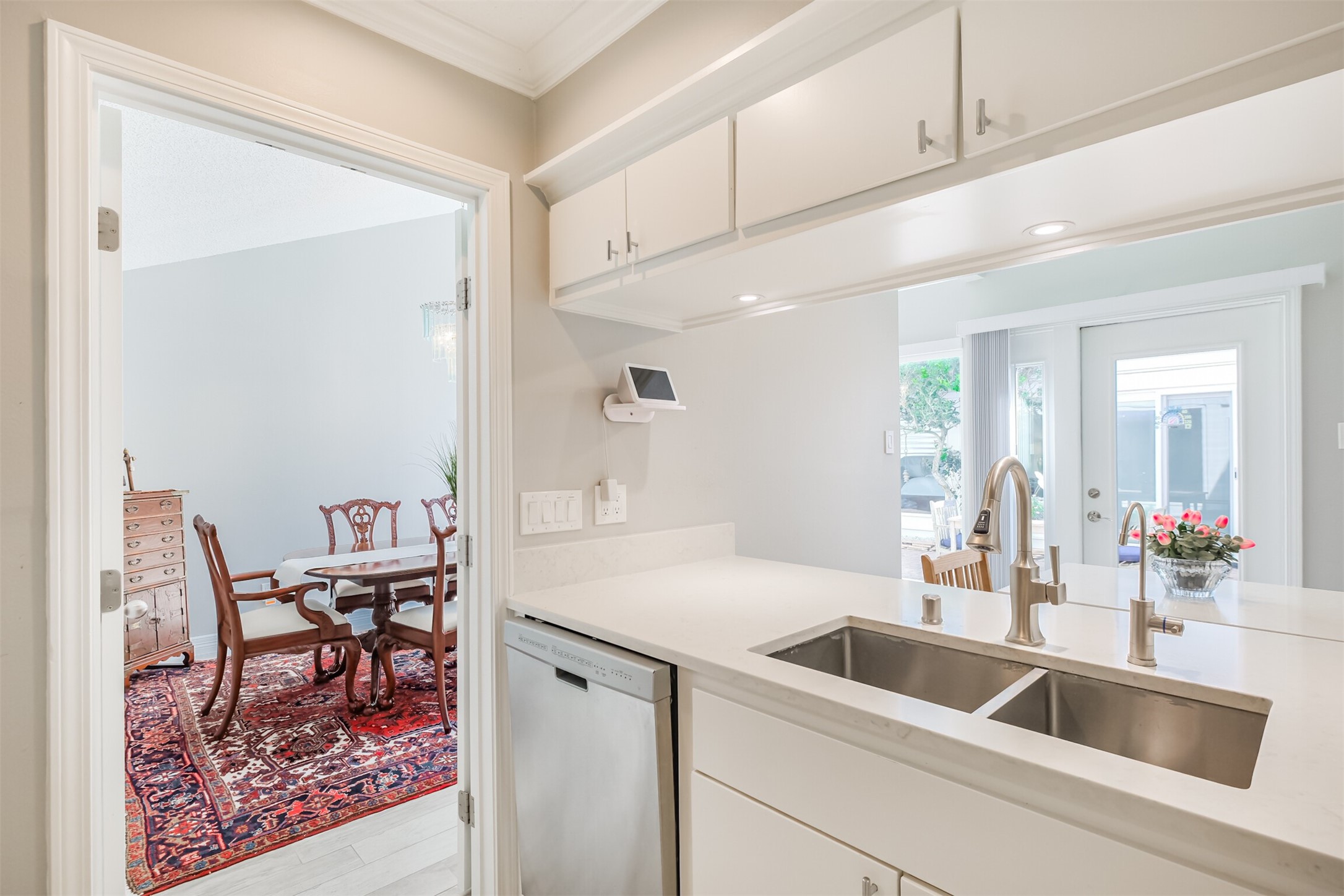 1007 Arrow Hill Road Houston, TX 77077 - Photo 13 of 48 There is a Kenmore Elite stainless steel dishwasher and stainless steel double basin sink in the island kitchen.