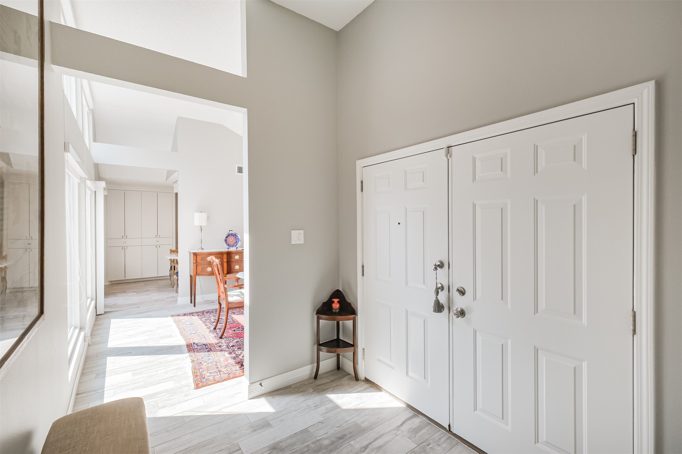 1007 Arrow Hill Road Houston, TX 77077 - Photo 3 of 48 There are double front doors at the entry. As soon as you enter the foyer you are greeted by tile wood floors that flow throughout the living spaces.