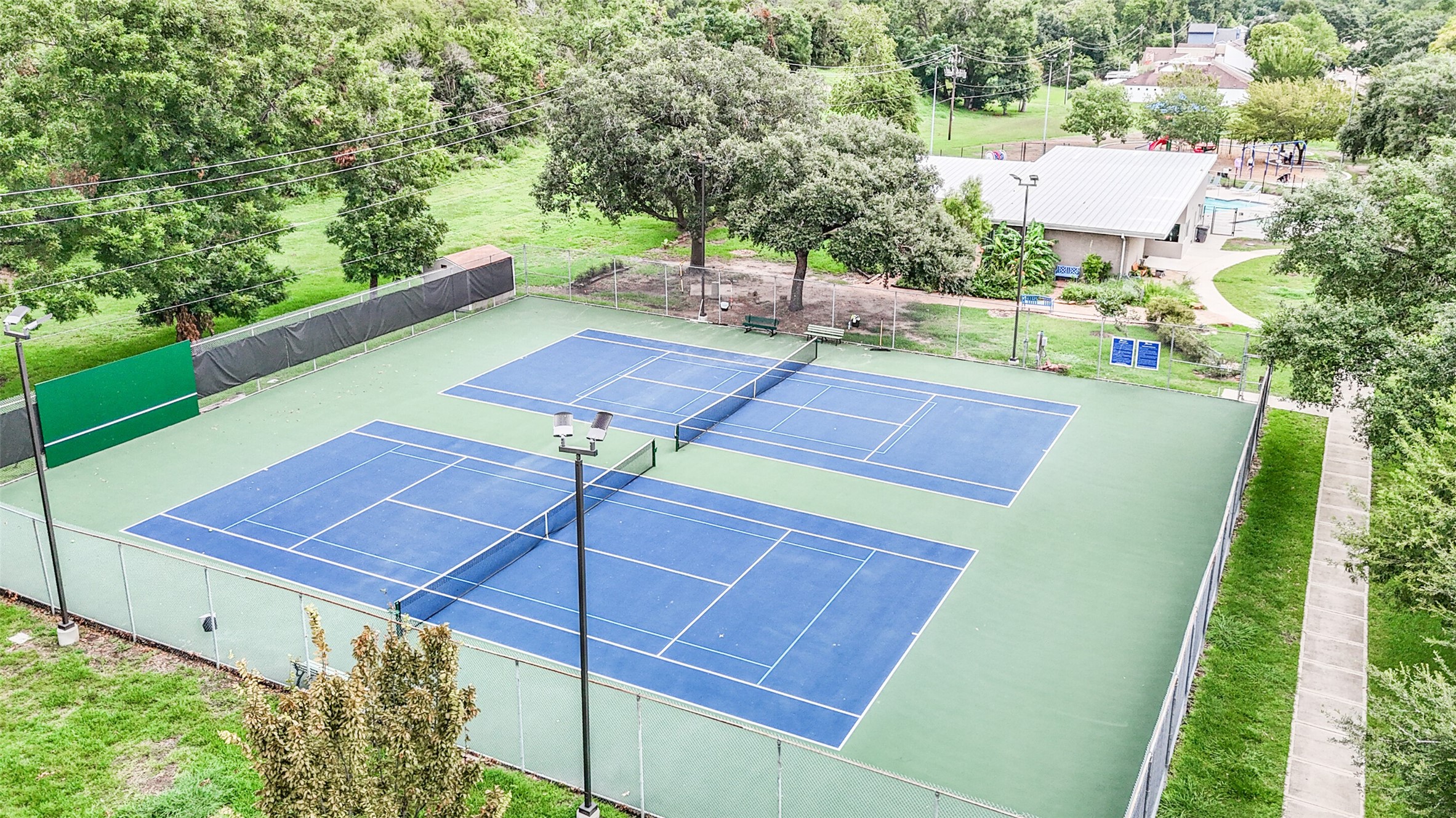1007 Arrow Hill Road Houston, TX 77077 - Photo 44 of 48 The tennis courts can be
reserved by homeowners and
renters in Briarhills.