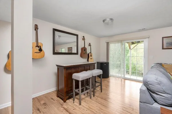 a living room with furniture and a table
