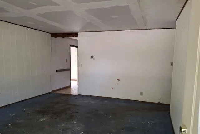 a kitchen with a stove and a refrigerator