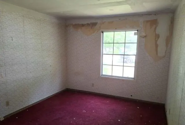 an empty room with a window