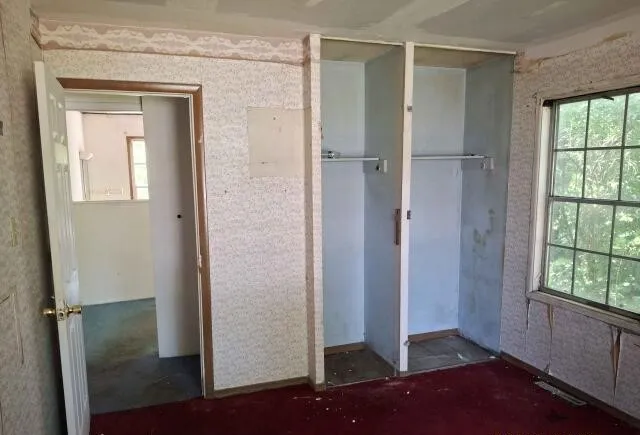 a bathroom with a toilet and a sink