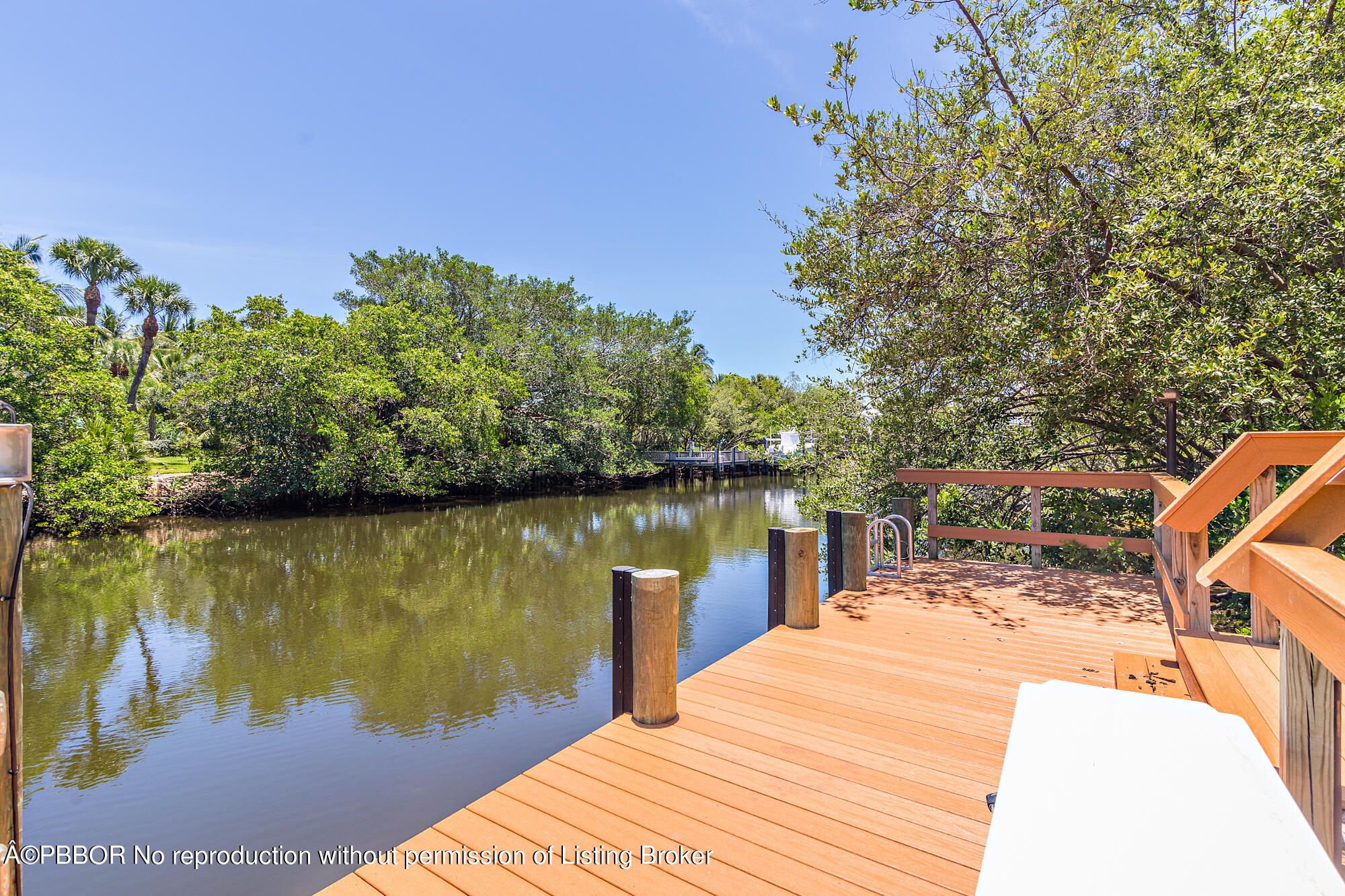 12358 Ridge Road North Palm Beach, FL 33408 - Photo 11 of 36 a view of a lake with houses