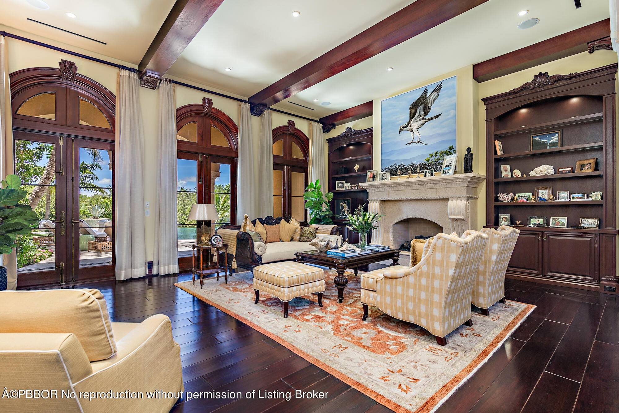 12358 Ridge Road North Palm Beach, FL 33408 - Photo 15 of 36 a living room with furniture fireplace and a large window
