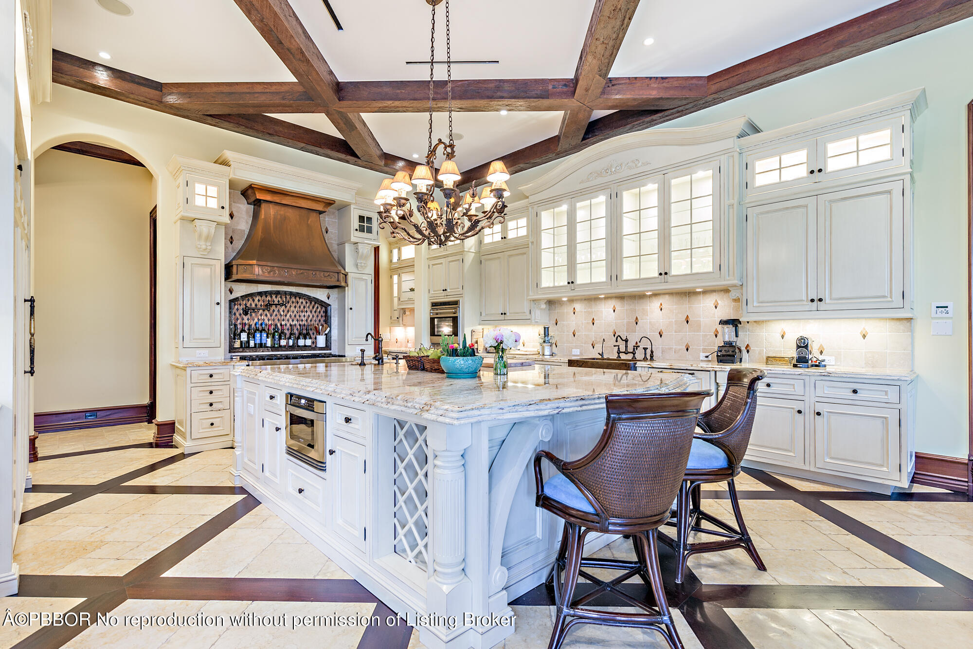 12358 Ridge Road North Palm Beach, FL 33408 - Photo 19 of 36 a kitchen with cabinets and chairs
